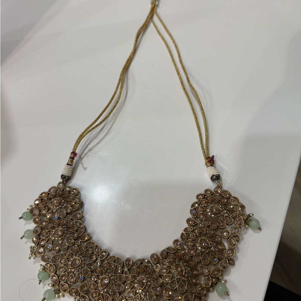Elegant Gold color Necklace‎ with Green Accents